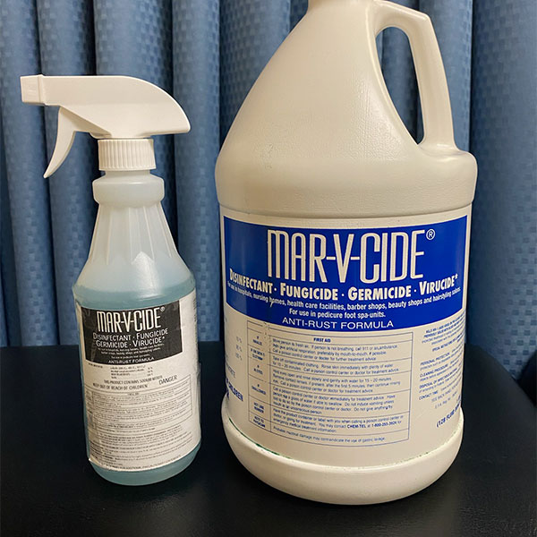Jug and sprayer bottle of Mar-V-Cide